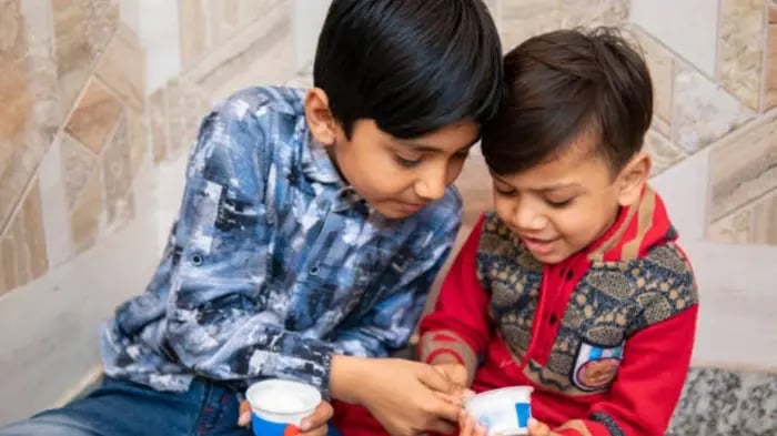 Indian Kid Eating Food