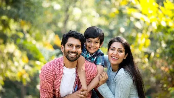 Indian parent sitting with their kids
