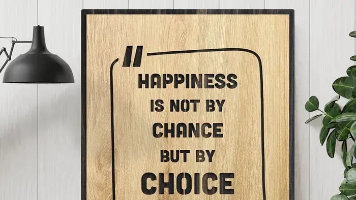 Quote About Happiness On A Brown Board