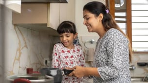 Indian Kid Cooking With Parents