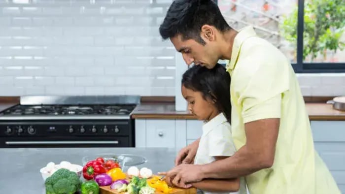 Indian Kid Cooking With Parents