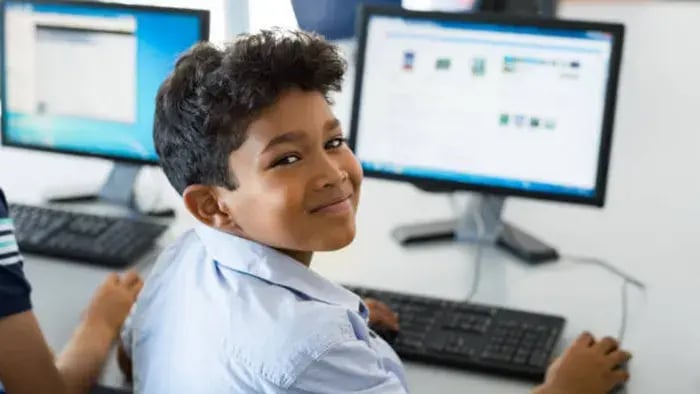 Indian kid using computer