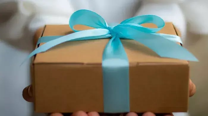Parcel with a blue ribbon