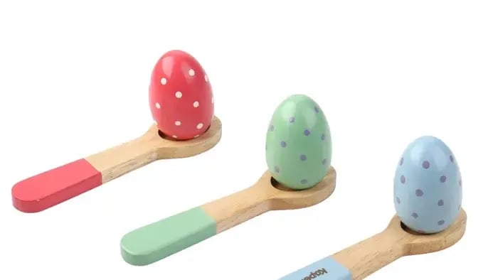 Toy spoon with a toy egg