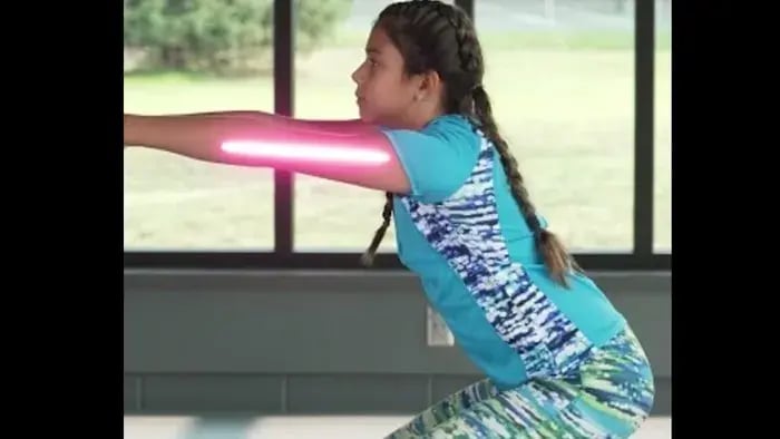 Girl exercising in a room