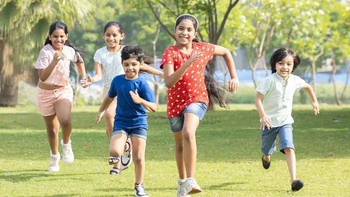 Kids running in a garden