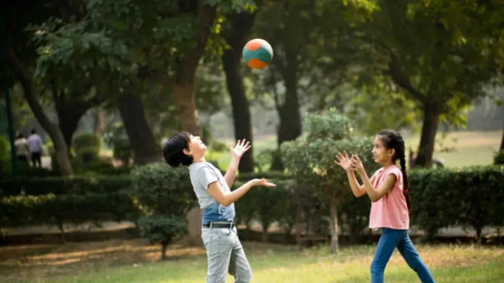 Indian kid playing in park