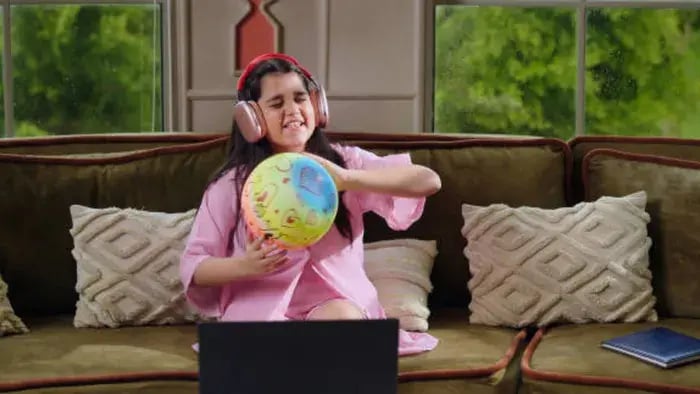 Indian kid listening to music