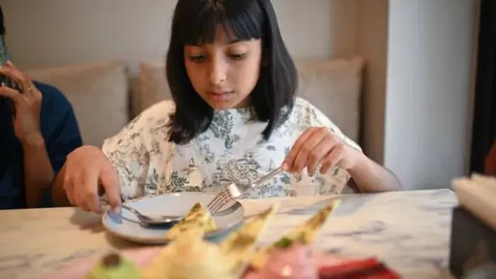 Indian kid eating