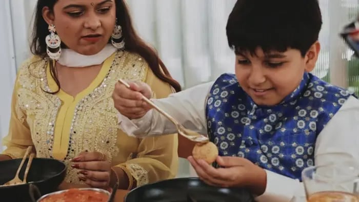 Indian Kid Eating Food