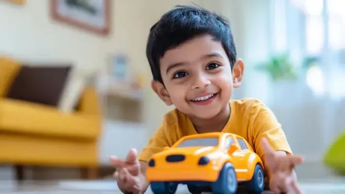 Indian kids playing with cars