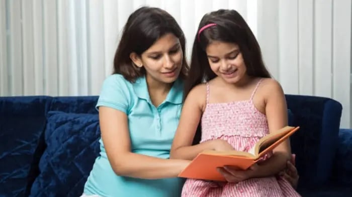 Two Pretty Indian Girls Gabbling About Stories