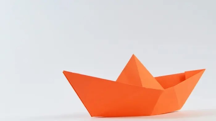 Paper Boat In Orange Color