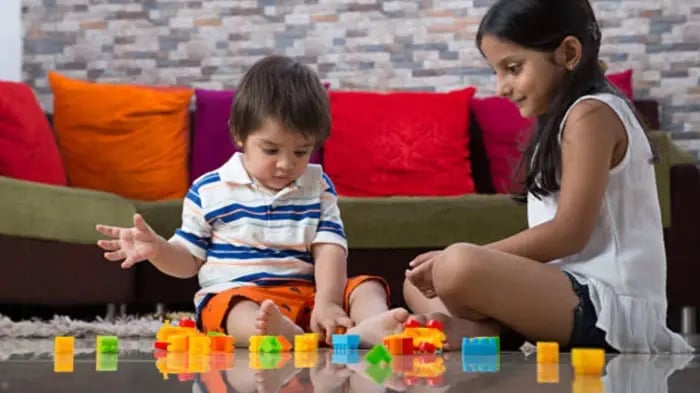 Indian Kid Playing Puzzle