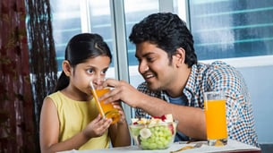 Indian kid eating healthy food