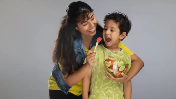 Indian Kids Eating Fruits