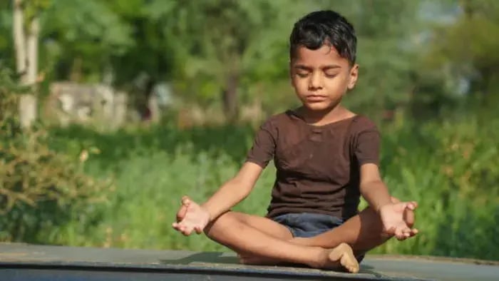 Indian Kid Drinking Water