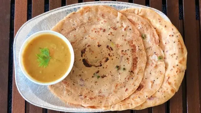 Yummy and Nutritious Recipes Ideas for Your Kid’s Healthy Meals - Wheat Dosa kept on a plate