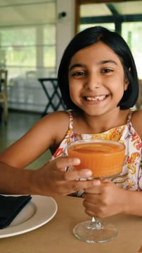 Indian kids eating snacks