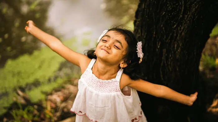happy girl with closed eyes